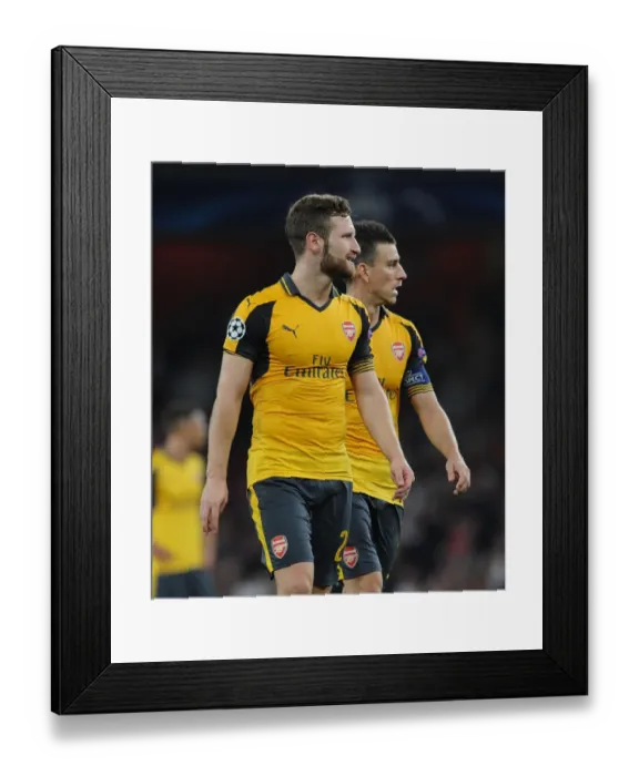 Framed Print : Arsenal's Mustafi and Koscielny in Action: Arsenal vs FC Basel (2016-17)
