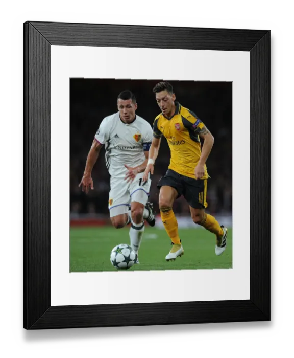 Framed Print : Mesut Ozil vs Marek Suchy: A Battle of Wits at Arsenal's Emirates Stadium - Arsenal FC vs FC Basel 2016-17 Framed Print : Mesut Ozil vs Marek Suchy: A Battle of Wits at Arsenal's Emirates Stadium - Arsenal FC vs FC Basel 2016-17