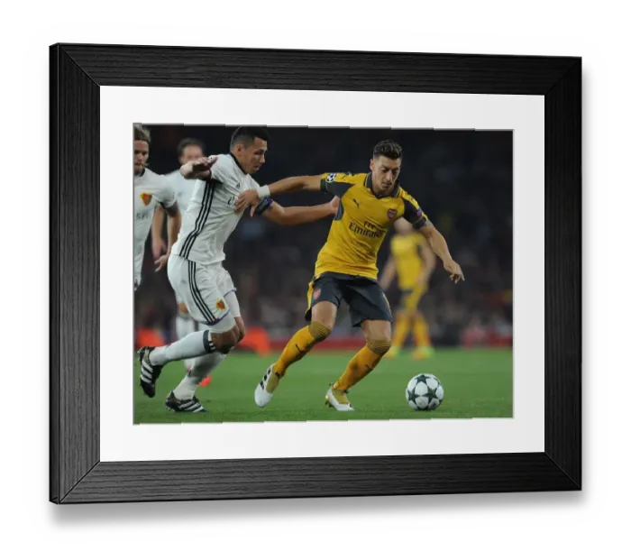 Framed Print : Mesut Ozil vs Marek Suchy: A Battle at the Emirates - Arsenal FC vs FC Basel UEFA Champions League Framed Print : Mesut Ozil vs Marek Suchy: A Battle at the Emirates - Arsenal FC vs FC Basel UEFA Champions League