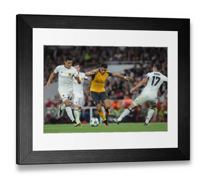 Framed Print : Showdown at Emirates: Sanchez vs. Elyounoussi in Arsenal's Champions League Battle