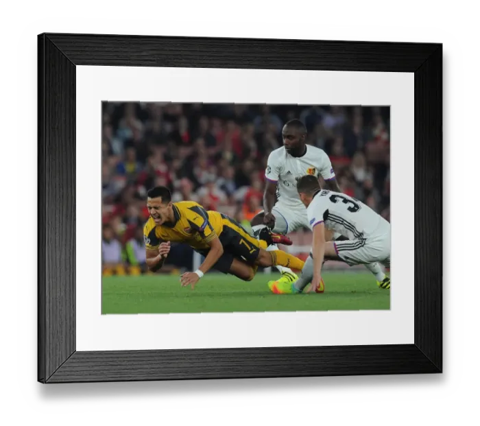 Framed Print : Clash of Stars: Sanchez vs. Doumbia & Xhaka - Arsenal vs. FC Basel UEFA Champions League