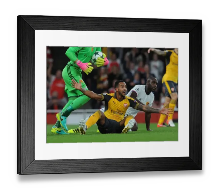 Framed Print : Theo Walcott vs. Eder Balanta: A Controversial Penalty Call in Arsenal's UEFA Champions League Clash with FC Basel Framed Print : Theo Walcott vs. Eder Balanta: A Controversial Penalty Call in Arsenal's UEFA Champions League Clash with FC Basel