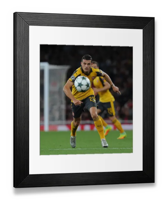 Framed Print : Granit Xhaka: Arsenal's Midfield Masterclass in UEFA Champions League Battle Against FC Basel (2016-17) Framed Print : Granit Xhaka: Arsenal's Midfield Masterclass in UEFA Champions League Battle Against FC Basel (2016-17)