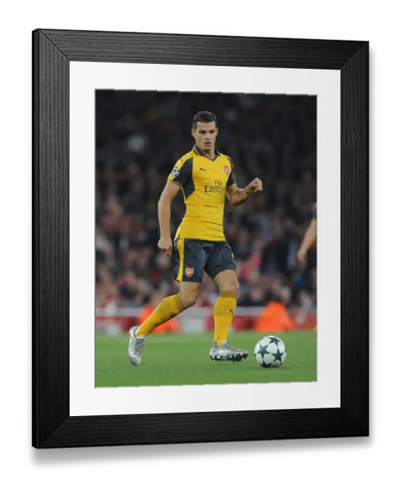 Framed Print : Granit Xhaka: In Action for Arsenal against FC Basel, UEFA Champions League (2016) Framed Print : Granit Xhaka: In Action for Arsenal against FC Basel, UEFA Champions League (2016)