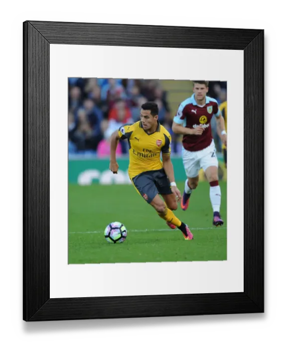 Framed Print : Alexis Sanchez vs Burnley: Intense Face-off in the 2016-17 Premier League Clash
