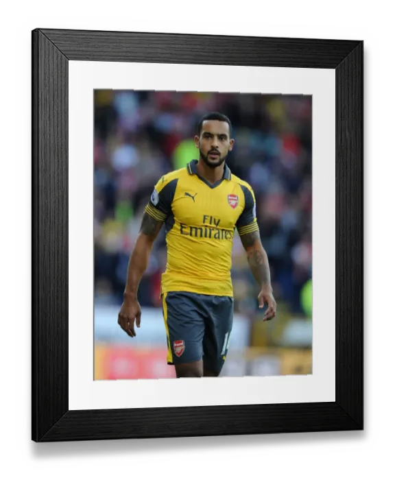 Framed Print : Arsenal's Walcott Faces Off Against Burnley in Premier League Showdown