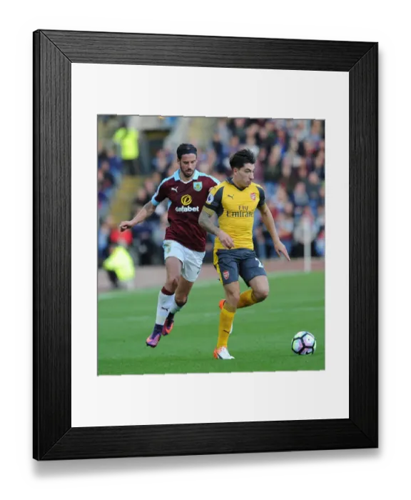 Framed Print : Bellerin vs Boyd: A Premier League Showdown at Turf Moor