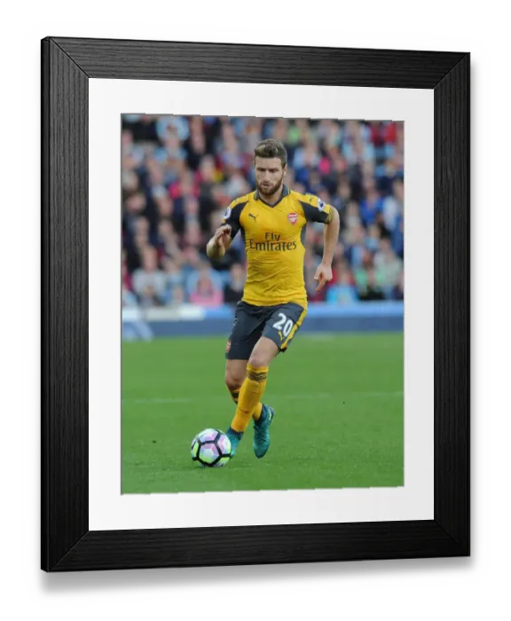 Framed Print : Shkodran Mustafi: Intense Focus in Burnley vs Arsenal Premier League Clash (2016-17)