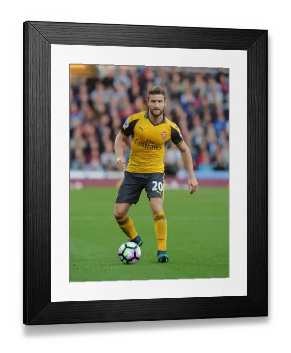 Framed Print : Shkodran Mustafi: Intense Focus Amidst Burnley vs Arsenal Premier League Battle (2016-17) Framed Print : Shkodran Mustafi: Intense Focus Amidst Burnley vs Arsenal Premier League Battle (2016-17)