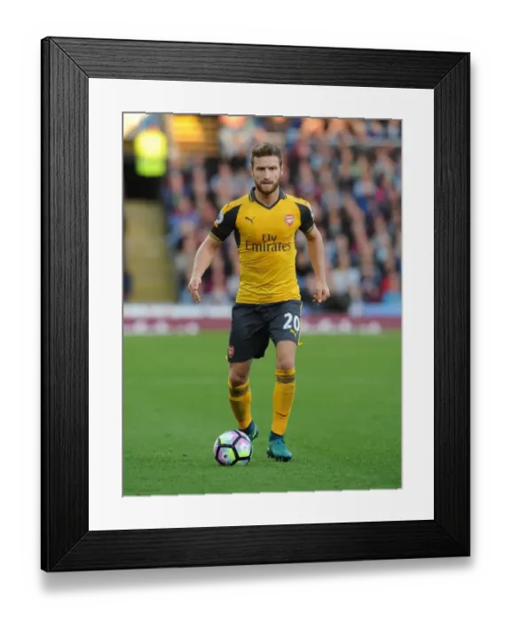 Framed Print : Shkodran Mustafi: Unwavering Concentration Amidst Burnley's Challenge (2016-17)
