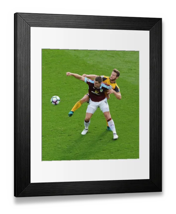 Framed Print : Mustafi vs Vokes: A Premier League Showdown at Burnley's Turf Moor, 2016-17 Framed Print : Mustafi vs Vokes: A Premier League Showdown at Burnley's Turf Moor, 2016-17