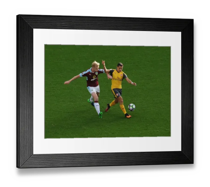 Framed Print : Intense Battle: Sanchez vs Mee - Premier League Showdown