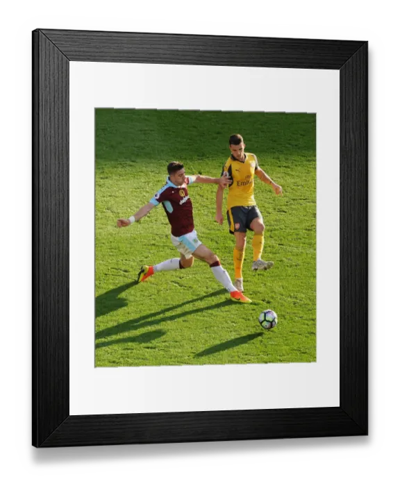 Framed Print : Xhaka vs Ward: A Football Battle at Turf Moor Framed Print : Xhaka vs Ward: A Football Battle at Turf Moor