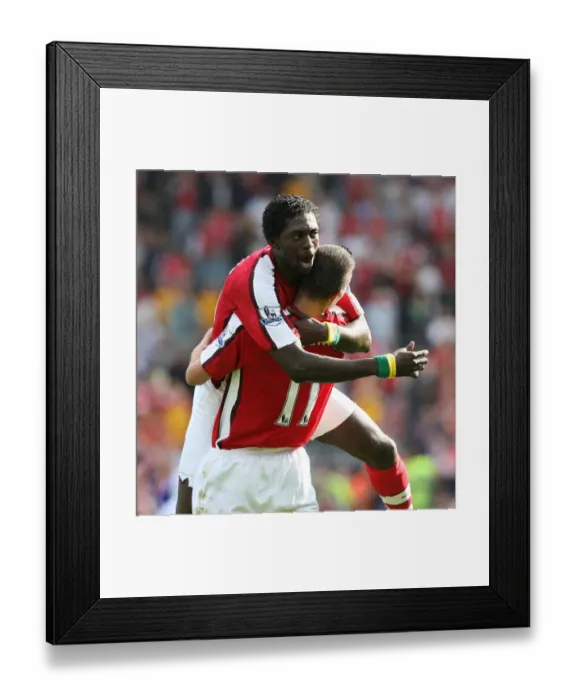 Framed Print : Adebayor and van Persie: Double Trouble - Arsenal's Unstoppable Duo Celebrates Goals Against Blackburn (0:4) Framed Print : Adebayor and van Persie: Double Trouble - Arsenal's Unstoppable Duo Celebrates Goals Against Blackburn (0:4)