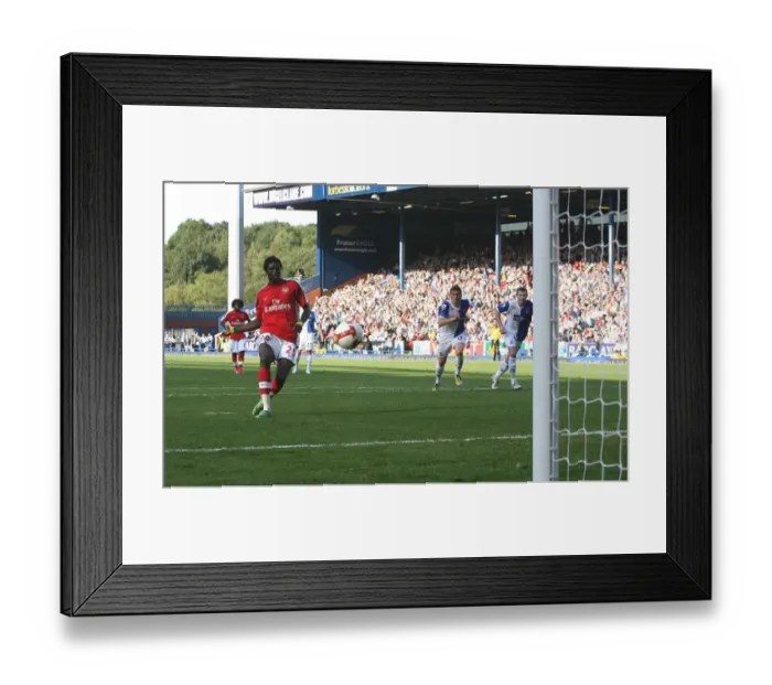 Framed Print : Emmanuel Adebayor shoots past Paul Robinson from Framed Print : Emmanuel Adebayor shoots past Paul Robinson from