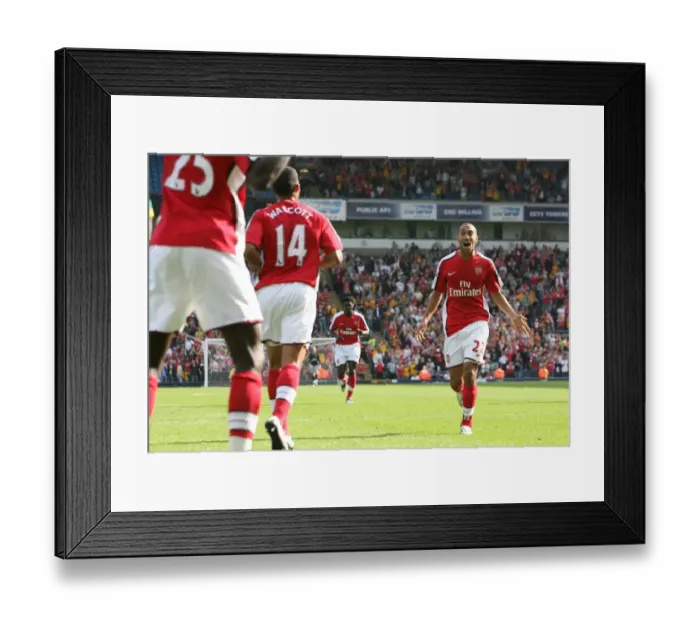Framed Print : Gael Clichy celebrates the 2nd Arsenal goal scored