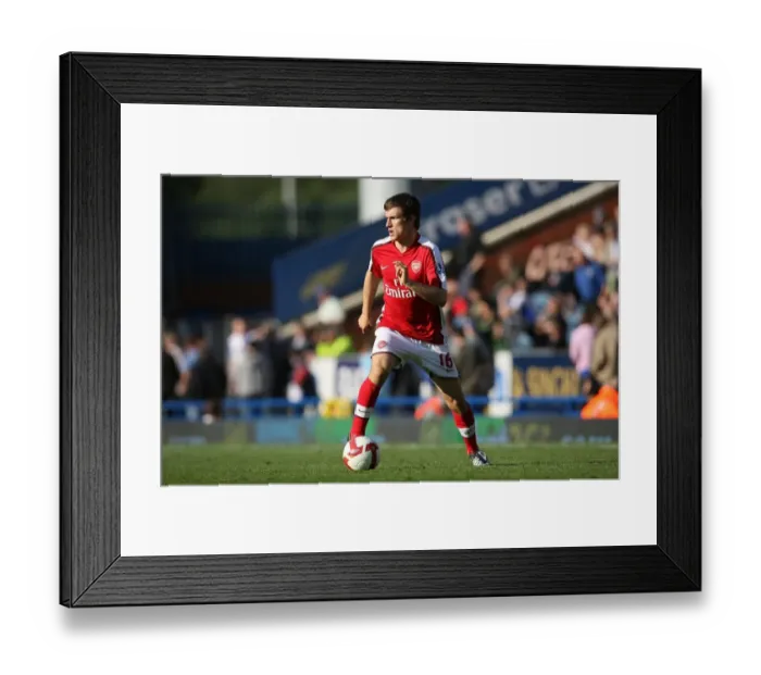 Framed Print : Arsenal's Aaron Ramsey Shines in Dominant 4-0 Debut Against Blackburn Rovers Framed Print : Arsenal's Aaron Ramsey Shines in Dominant 4-0 Debut Against Blackburn Rovers