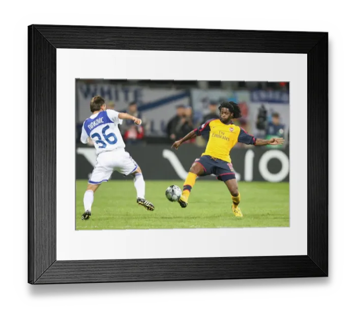Framed Print : Alex Song (Arsenal) Milos Ninkovic (Dynamo Kiev) Framed Print : Alex Song (Arsenal) Milos Ninkovic (Dynamo Kiev)