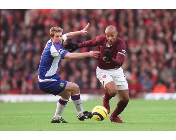 Thierry Henry (Arsenal) Andy Todd (Blackburn). Arsenal 3: 0 Blackburn Rovers