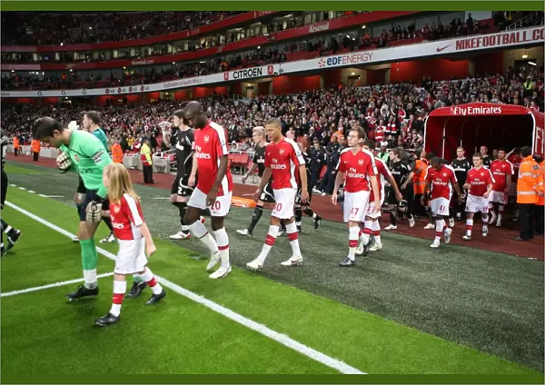 Captain Lucasz Fabianski leads the Arsenal team out