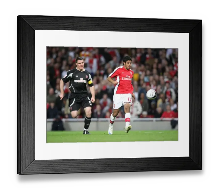 Framed Print : Vela's Stunner: Arsenal's 6-0 Rout of Sheffield United in Carling Cup Framed Print : Vela's Stunner: Arsenal's 6-0 Rout of Sheffield United in Carling Cup