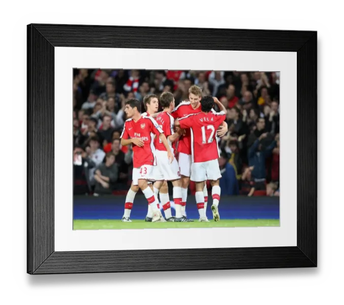 Framed Print : Nicklas Bendtner's Euphoric Goal: Arsenal Crushes Sheffield United 6-0 in Carling Cup