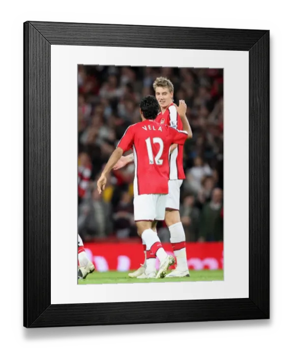 Framed Print : Bendtner and Vela's Double Strike: Arsenal's Dominant 6-0 Carling Cup Win Over Sheffield United Framed Print : Bendtner and Vela's Double Strike: Arsenal's Dominant 6-0 Carling Cup Win Over Sheffield United