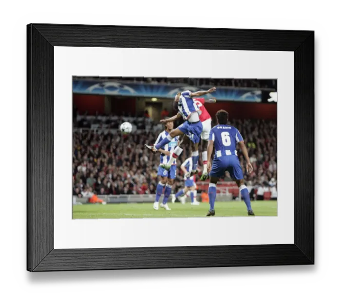 Framed Print : Adebayor's Pressure-Cooker Goal: Arsenal's 4-0 Victory Over Porto in the Champions League