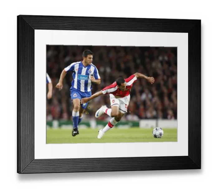 Framed Print : Arsenal's Theo Walcott Scores Brace Against Porto's Nelson Benitez in 4-0 UEFA Champions League Victory at Emirates Stadium (September 30, 2008)