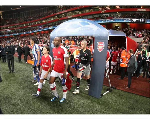 Arsenal captain William Gallas leads the team out