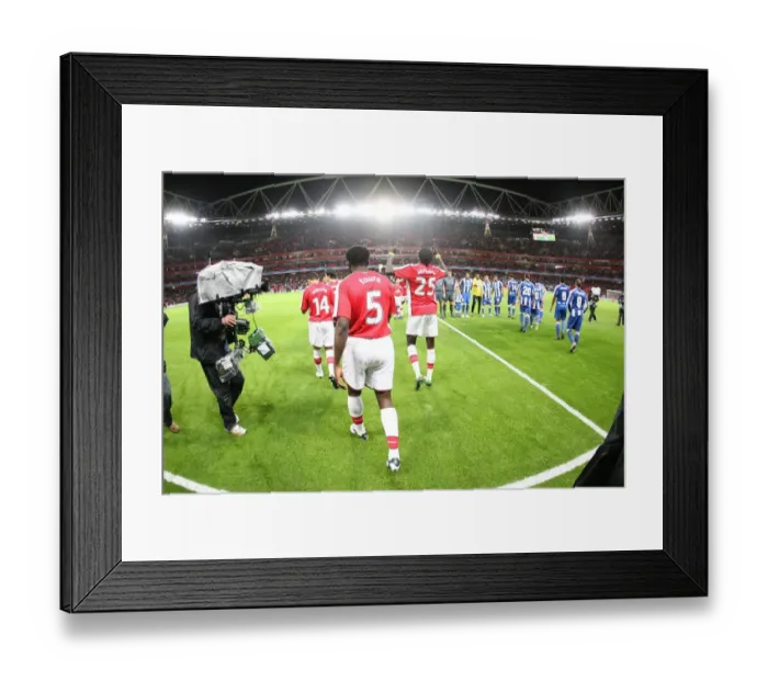Framed Print : Arsenal's Kolo Toure Shines in 4-0 UEFA Champions League Victory over FC Porto at Emirates Stadium, 2008