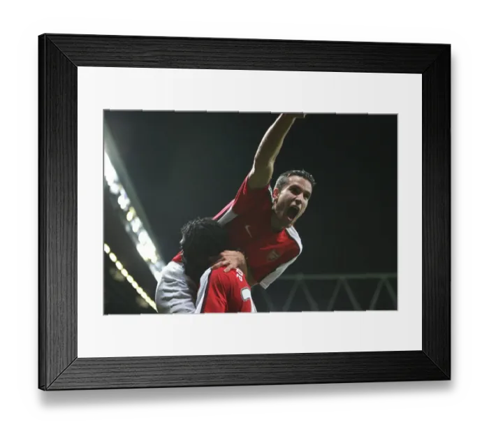 Framed Print : Robin van Persie's Thrilling Debut: Arsenal 4-0 FC Porto, Champions League (Van Persie's First Arsenal Goal with Adebayor) Framed Print : Robin van Persie's Thrilling Debut: Arsenal 4-0 FC Porto, Champions League (Van Persie's First Arsenal Goal with Adebayor)