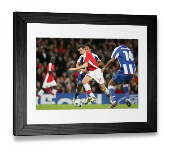 Framed Print : Robin van Persie shoots past Porto goalkeeper Helton