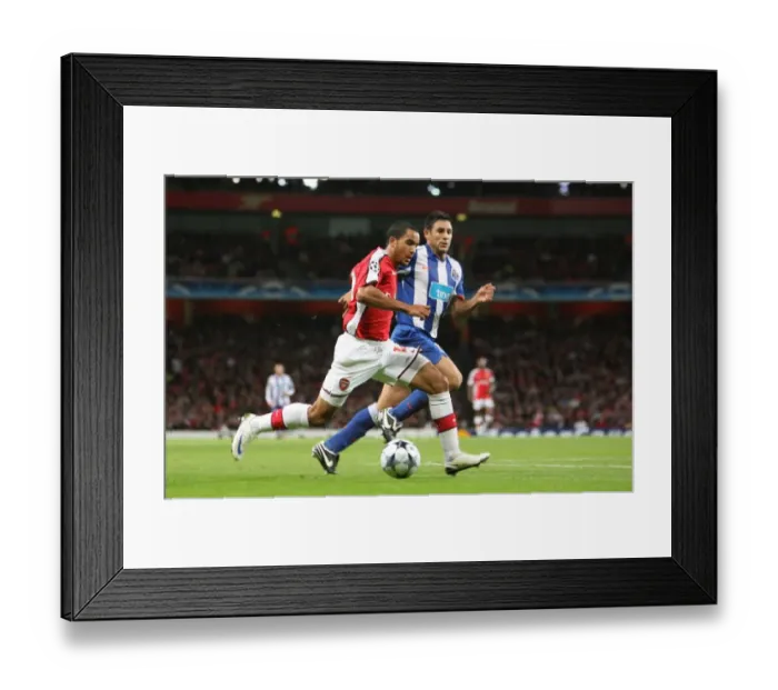 Framed Print : Theo Walcott's Unforgettable Night: Arsenal's 4-0 Thrashing of FC Porto in the Champions League Framed Print : Theo Walcott's Unforgettable Night: Arsenal's 4-0 Thrashing of FC Porto in the Champions League