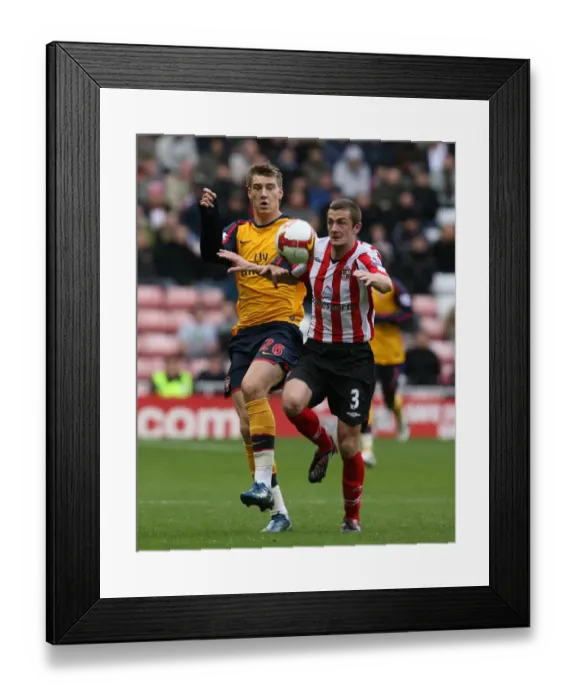 Framed Print : Nicklas Bendtner (Arsenal) George McCartney (Sunderland) Framed Print : Nicklas Bendtner (Arsenal) George McCartney (Sunderland)