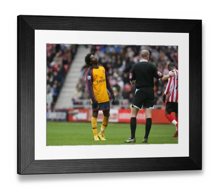 Framed Print : Alex Song (Arsenal) is booked by referee Lee Mason Framed Print : Alex Song (Arsenal) is booked by referee Lee Mason