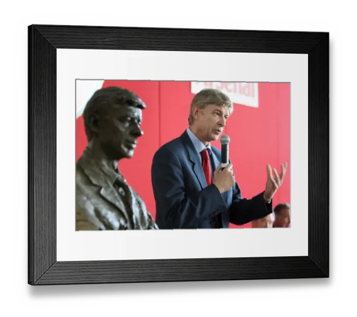 Framed Print : Arsene Wenger the Arsenal Manager stands near his bust Framed Print : Arsene Wenger the Arsenal Manager stands near his bust