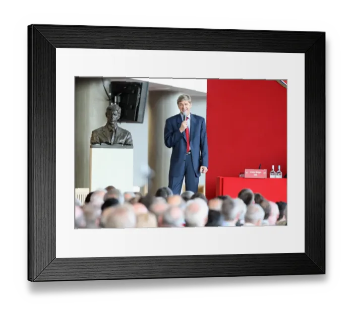 Framed Print : Arsene Wenger the Arsenal Manager stands next to the bust of himself Framed Print : Arsene Wenger the Arsenal Manager stands next to the bust of himself