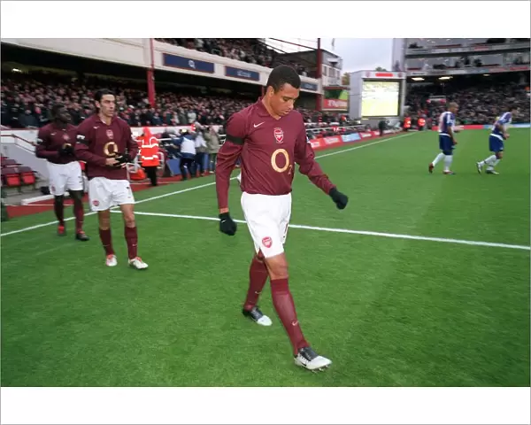 Gilberto (Arsenal) walks out on to the pitch before the match