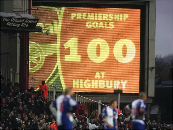 The jumbotron informs the fans that Thierry Henry has scored 100 Premiership goals at Highbury