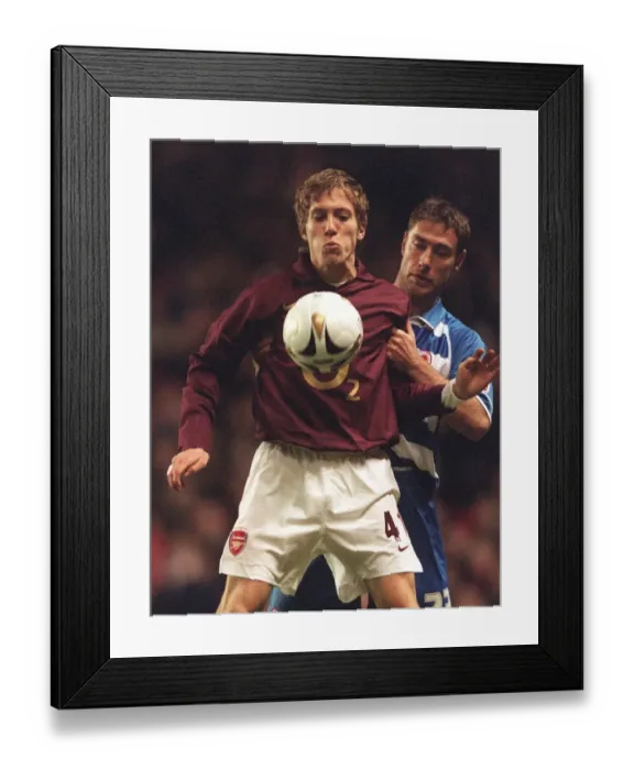 Framed Print : Arturo Lupoli (Arsenal) Chris Makin (Reading). Arsenal 3: 0 Reading