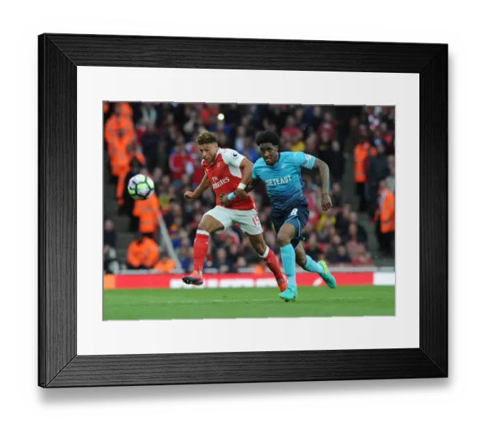 Framed Print : Oxlade-Chamberlain vs. Fer: A Premier League Showdown at Emirates Stadium