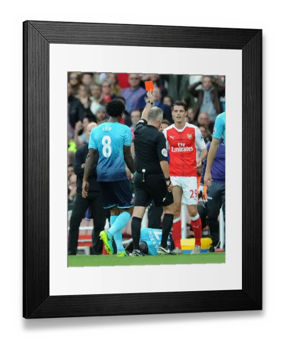 Framed Print : Arsenal's Xhaka Red-Carded in Premier League Clash Against Swansea City Framed Print : Arsenal's Xhaka Red-Carded in Premier League Clash Against Swansea City