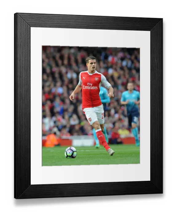 Framed Print : Granit Xhaka: In Action for Arsenal Against Swansea City, Premier League 2016-17 Framed Print : Granit Xhaka: In Action for Arsenal Against Swansea City, Premier League 2016-17
