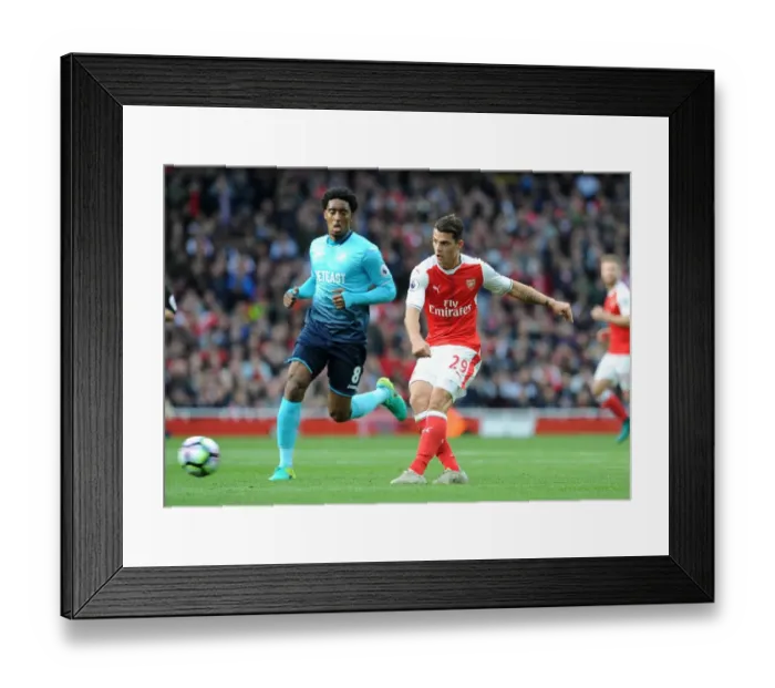 Framed Print : Xhaka Stands Firm: Arsenal vs Swansea City Tussle in Premier League
