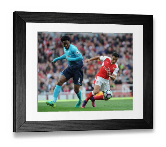 Framed Print : Tense Arsenal vs Swansea Battle: Alexis Sanchez Under Pressure at Emirates Stadium, October 2016 Framed Print : Tense Arsenal vs Swansea Battle: Alexis Sanchez Under Pressure at Emirates Stadium, October 2016