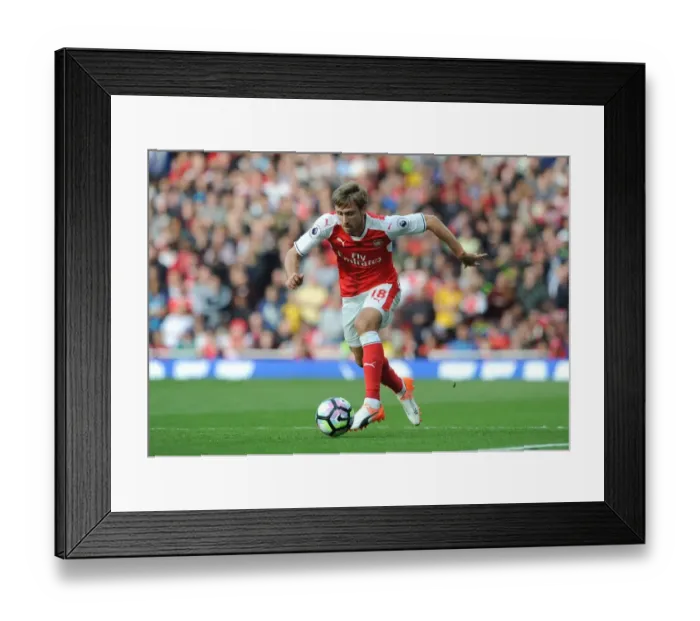 Framed Print : Monreal in Action: Arsenal vs Swansea City (2016-17), Emirates Stadium