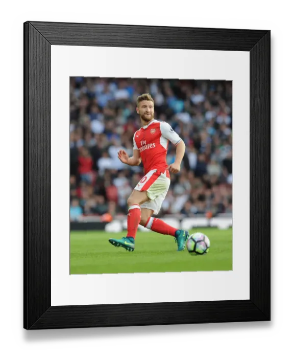 Framed Print : Arsenal's Mustafi in Action: Arsenal vs Swansea City (2016-17)