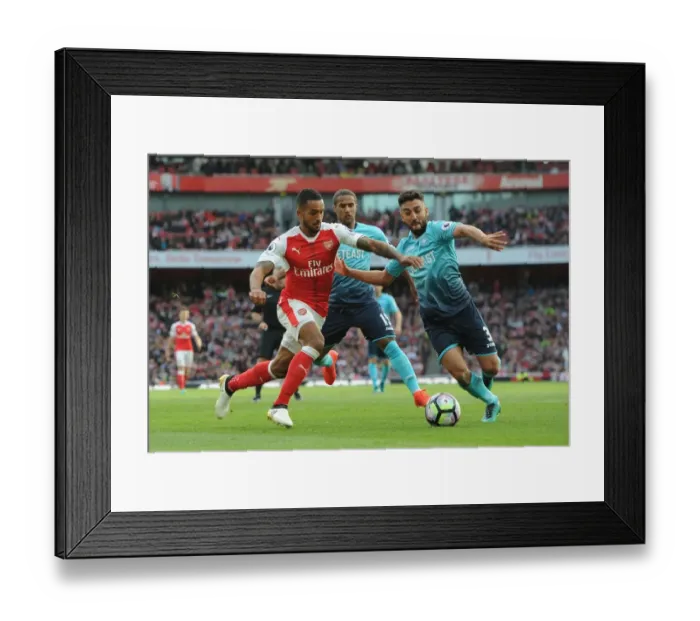 Framed Print : Arsenal's Theo Walcott vs Swansea's Neil Taylor: A Battle at Emirates Stadium Framed Print : Arsenal's Theo Walcott vs Swansea's Neil Taylor: A Battle at Emirates Stadium