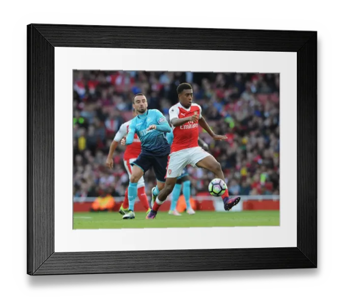 Framed Print : Intense Rivalry: Iwobi vs Britton in Arsenal vs Swansea Premier League Clash Framed Print : Intense Rivalry: Iwobi vs Britton in Arsenal vs Swansea Premier League Clash